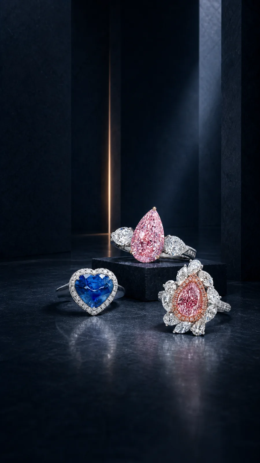 Three exceptional pink and blue gemstone rings in a private exhibition